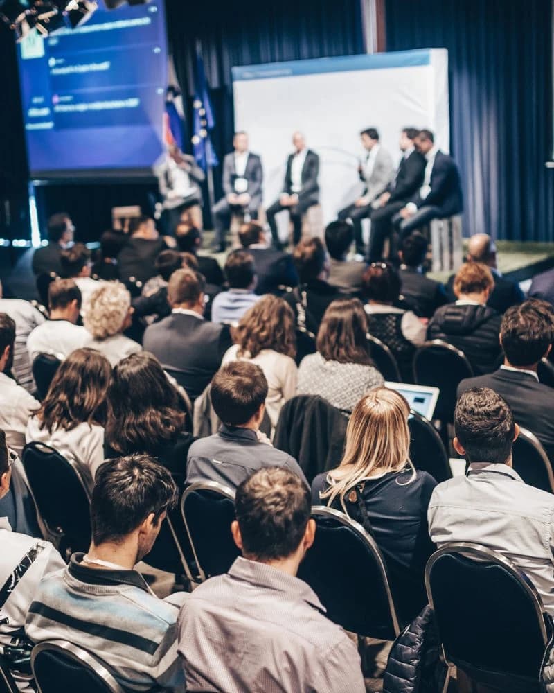 A round-table discussion at a business conference